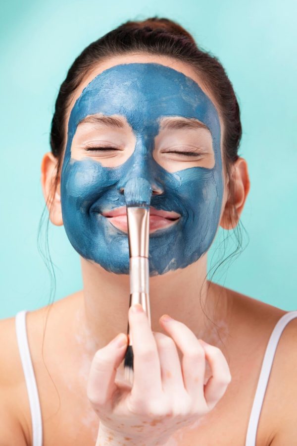 portrait-gorgeous-woman-using-face-mask(1) cosmetic clinic calicut
